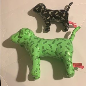 Two PINK plush/leather collectible dogs .